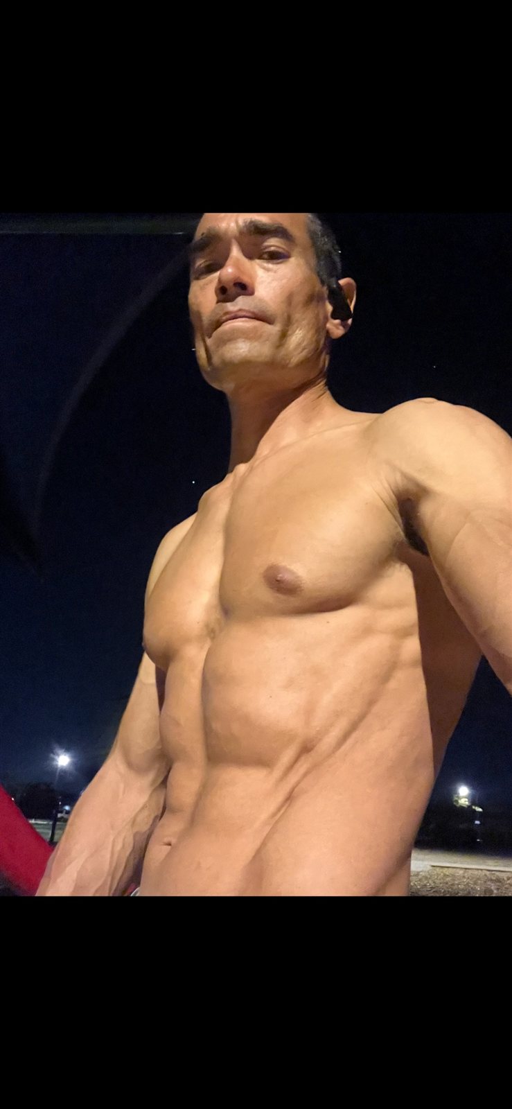 Clinton Knopp SuperXCentric night fitness portrait outdoors